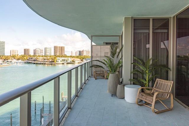 balcony featuring a water view