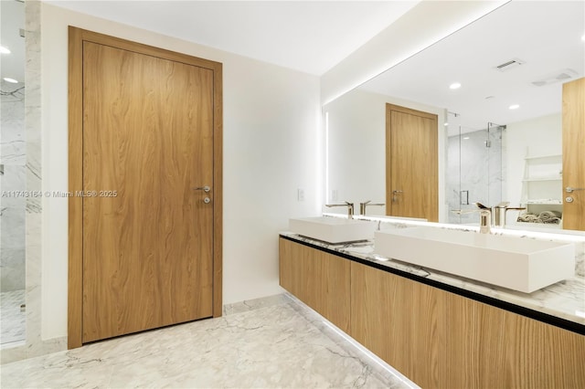 1135 103rd St Unit 602, Bay Harbor Islands, FL 33154 - bathroom featuring marble tiled flooring, a marble finish shower, double vanity, and recessed lighting