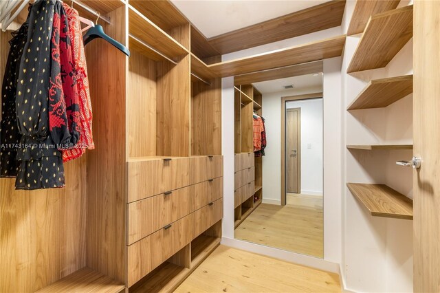 1135 103rd St Unit 602, Bay Harbor Islands, FL 33154 - walk in closet with wood finished floors