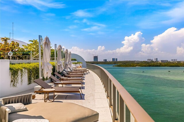 1135 103rd St Unit 602, Bay Harbor Islands, FL 33154 - dock area with a water view