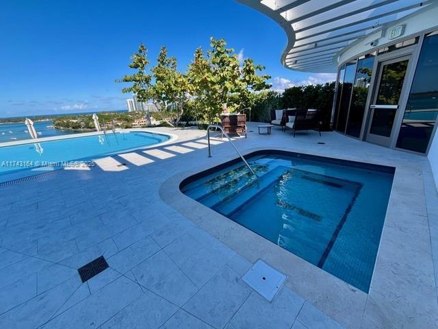 view of pool with a patio area