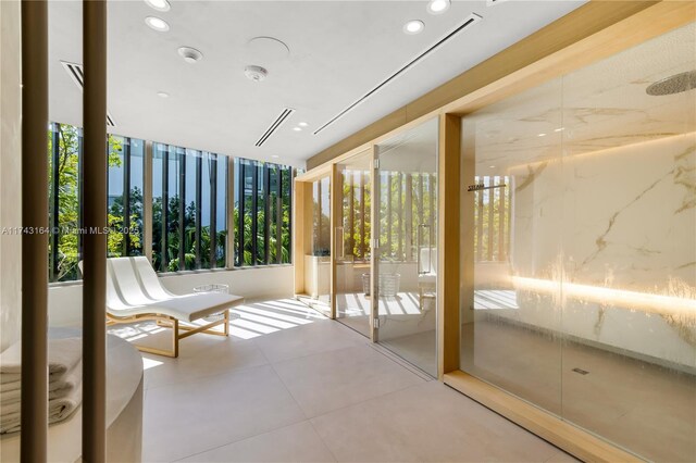 1135 103rd St Unit 602, Bay Harbor Islands, FL 33154 - unfurnished sunroom with healthy amount of natural light