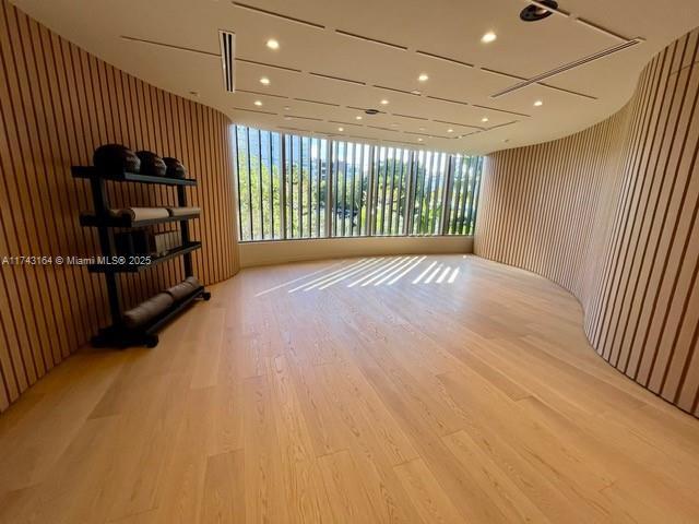 spare room featuring light hardwood / wood-style flooring