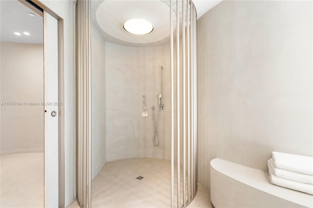1135 103rd St Unit 602, Bay Harbor Islands, FL 33154 - bathroom featuring a walk in shower