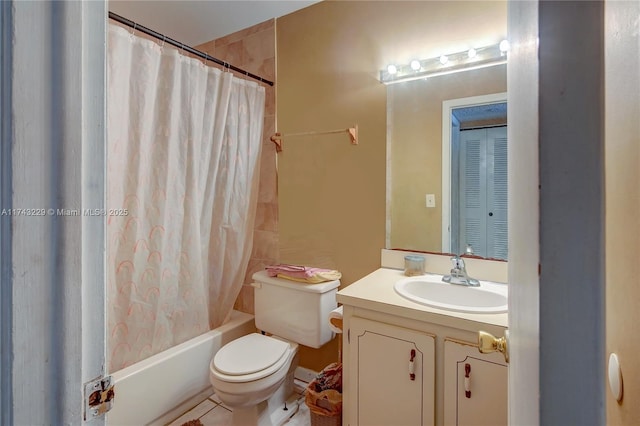 full bathroom with vanity, shower / tub combo, and toilet