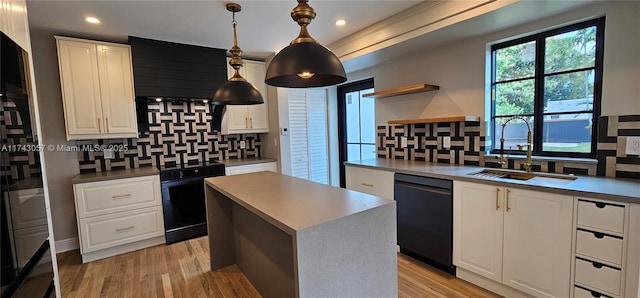 kitchen featuring backsplash, open shelves, black appliances, and a sink