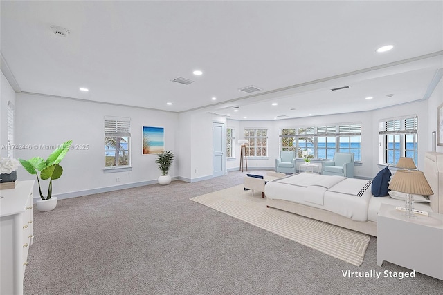 bedroom featuring ornamental molding and light carpet