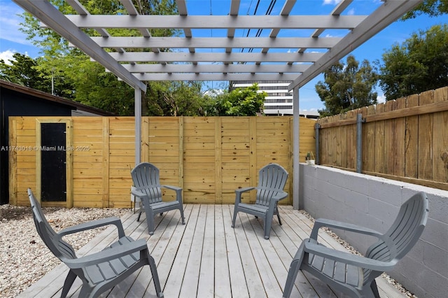 wooden terrace with a pergola