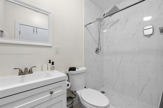 bathroom featuring walk in shower, vanity, and toilet