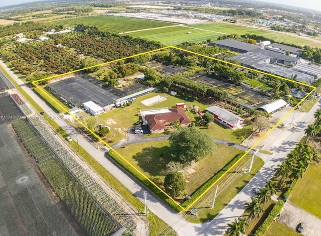 birds eye view of property featuring a rural view