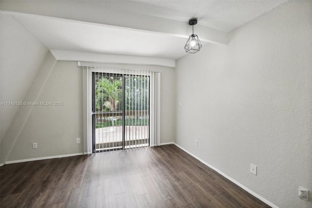 empty room with dark wood-type flooring