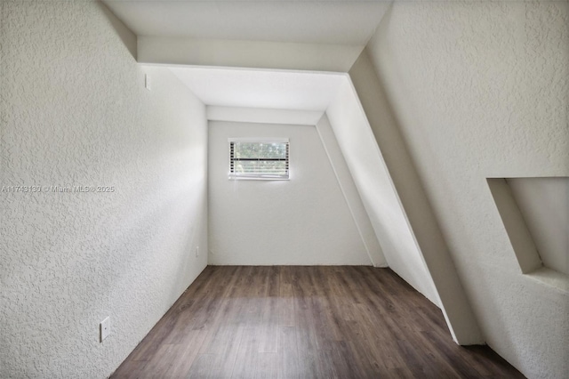 empty room with dark hardwood / wood-style floors