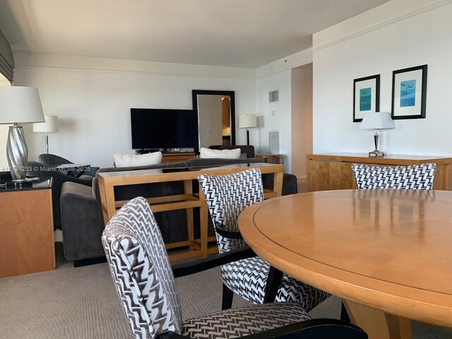 1435 Brickell Ave Unit 3506, Miami, FL 33131 - dining space featuring carpet floors