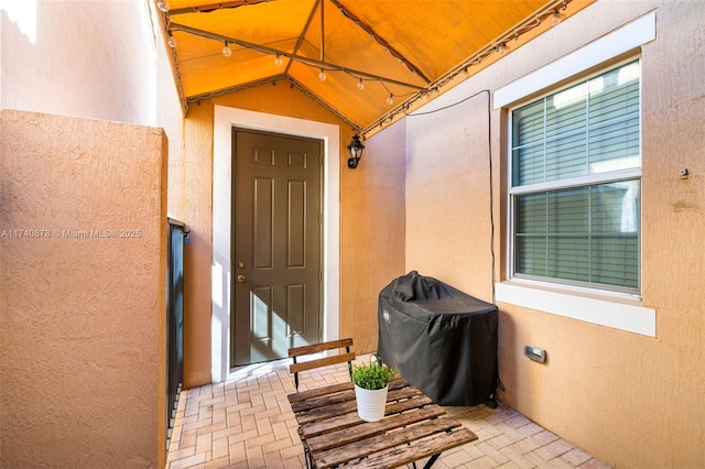 doorway to property featuring a patio