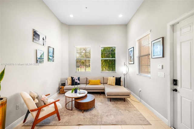 living room with light tile patterned flooring