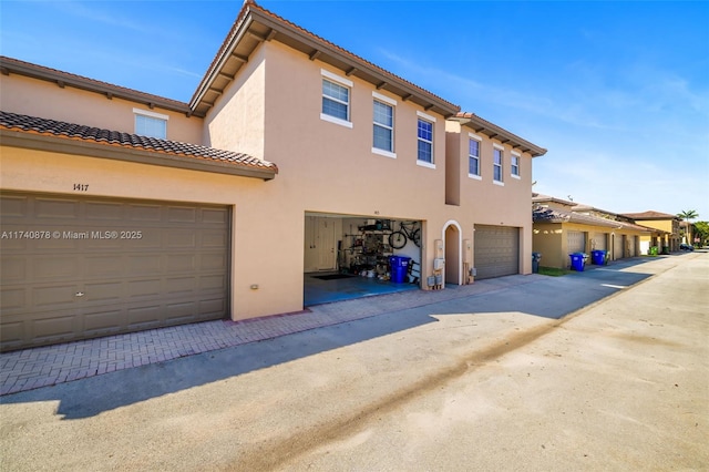 exterior space with a garage