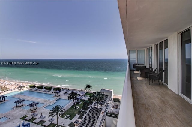 view of water feature with a beach view