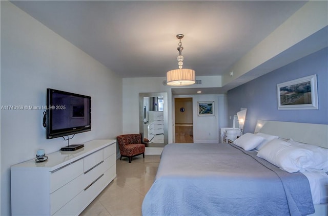 bedroom featuring light tile patterned flooring