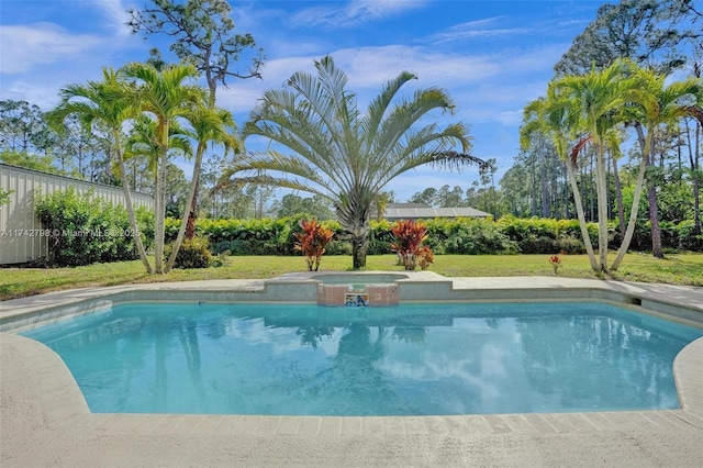 view of pool with a lawn