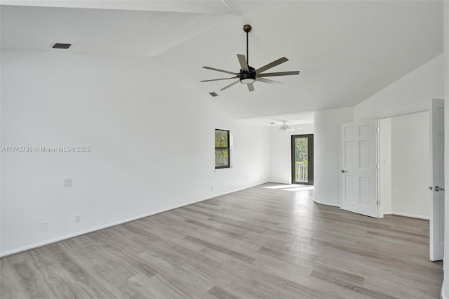 spare room featuring high vaulted ceiling, ceiling fan, and light hardwood / wood-style flooring