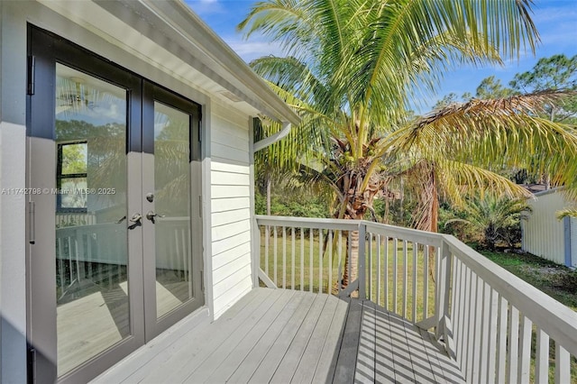 deck featuring a lawn