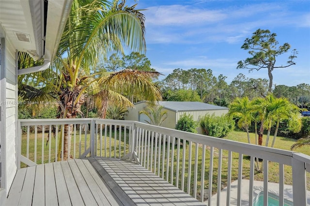 deck featuring a lawn