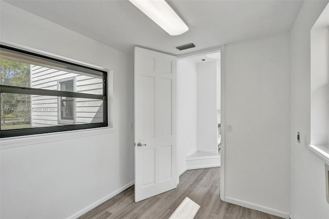 bedroom with light wood-type flooring