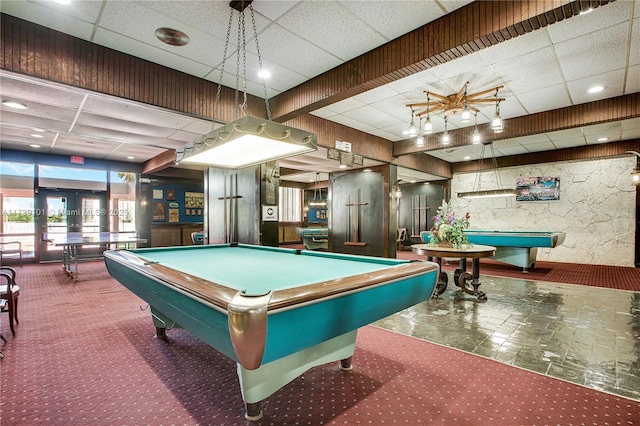 playroom with french doors, dark colored carpet, a paneled ceiling, and billiards