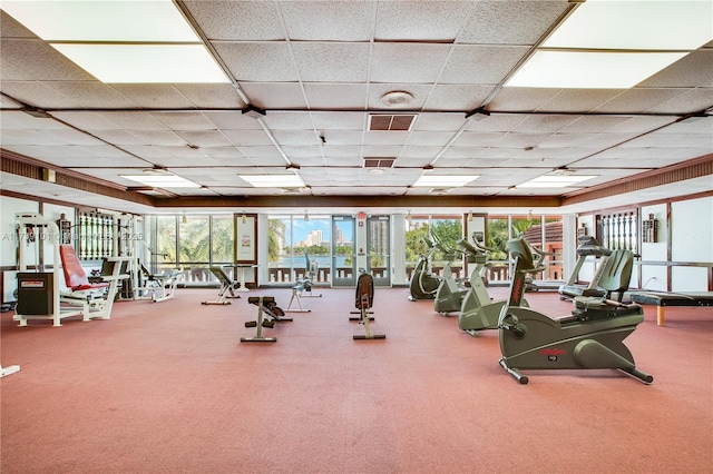 workout area with a drop ceiling