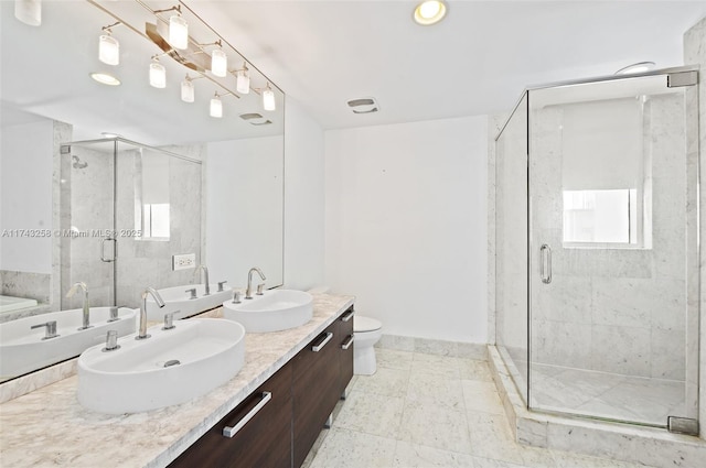 full bathroom with toilet, separate shower and tub, and vanity