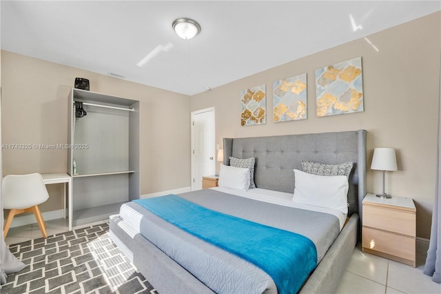 bedroom featuring visible vents and baseboards