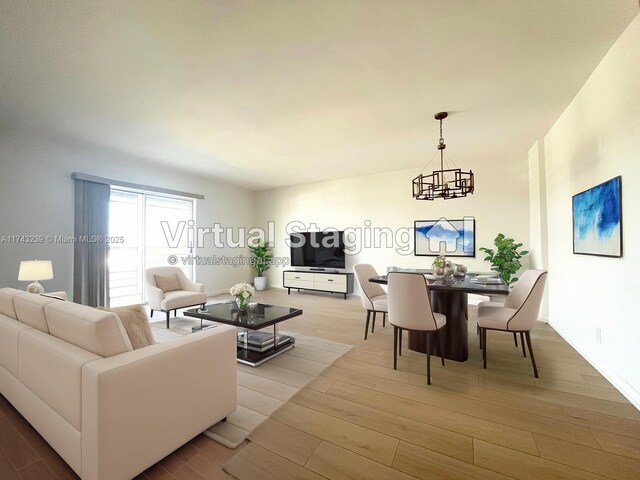 kitchen featuring appliances with stainless steel finishes, sink, light tile patterned floors, and white cabinets