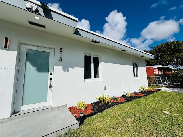 exterior space with a lawn