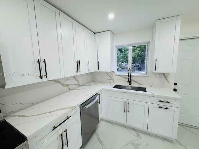 kitchen featuring sink, light stone countertops, white cabinets, and dishwasher