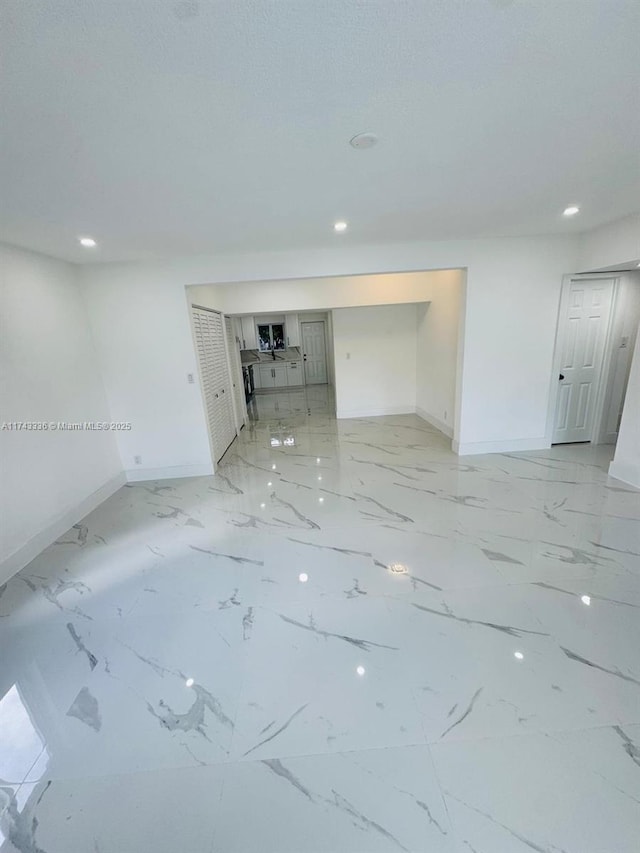 spare room featuring a textured ceiling