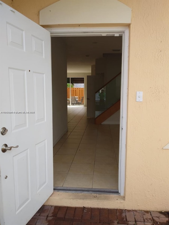 hall featuring tile patterned floors