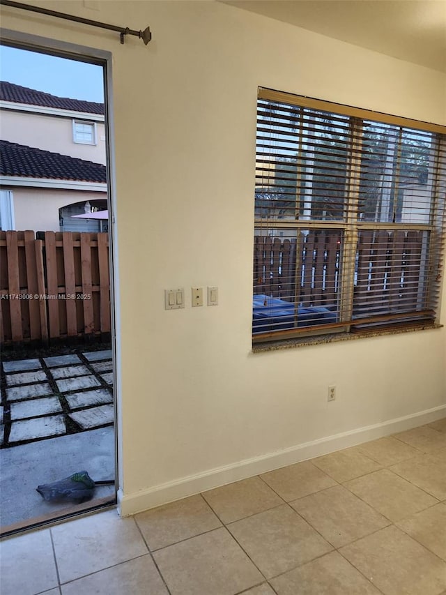 view of tiled spare room