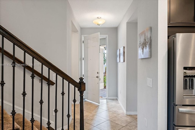 view of tiled entrance foyer