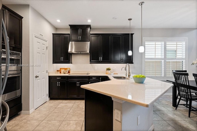 kitchen featuring decorative light fixtures, sink, light tile patterned floors, stainless steel double oven, and black electric cooktop