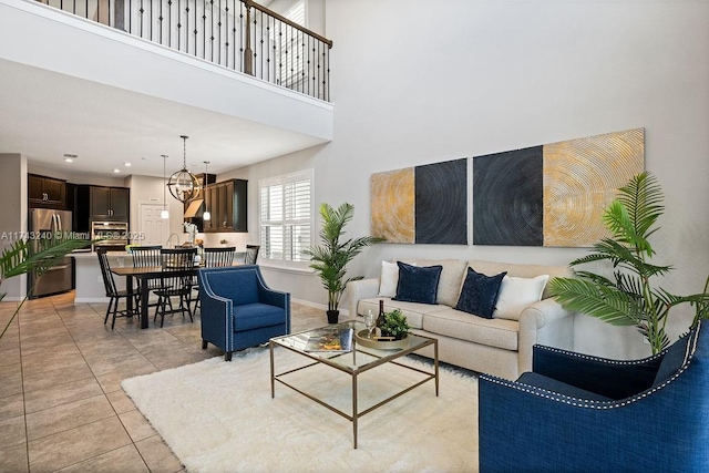 tiled living room featuring a towering ceiling