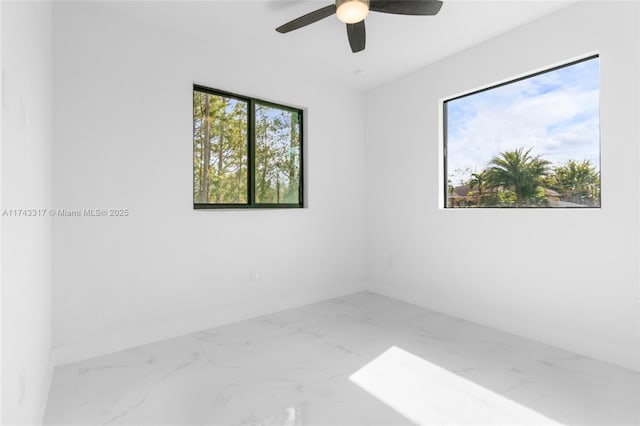 unfurnished room featuring ceiling fan