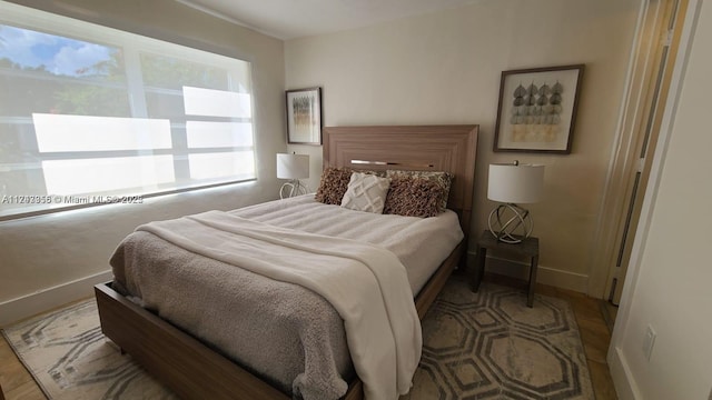 bedroom featuring baseboards