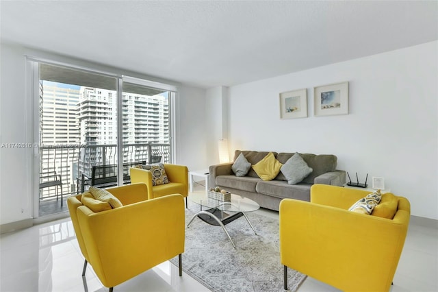 living room with floor to ceiling windows