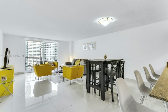 view of tiled dining space