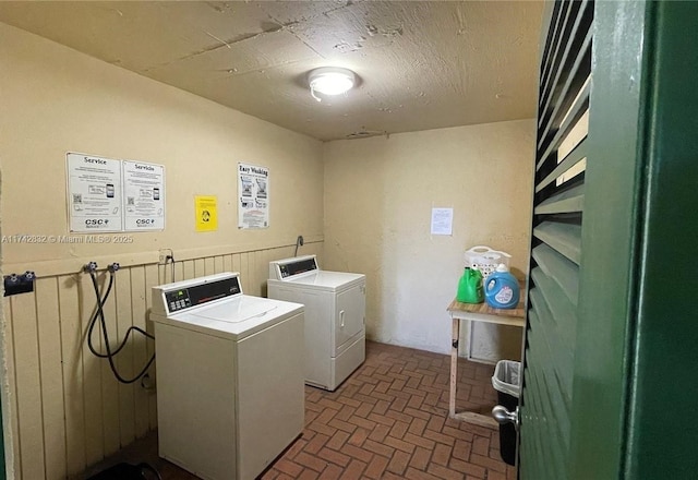 laundry room with separate washer and dryer