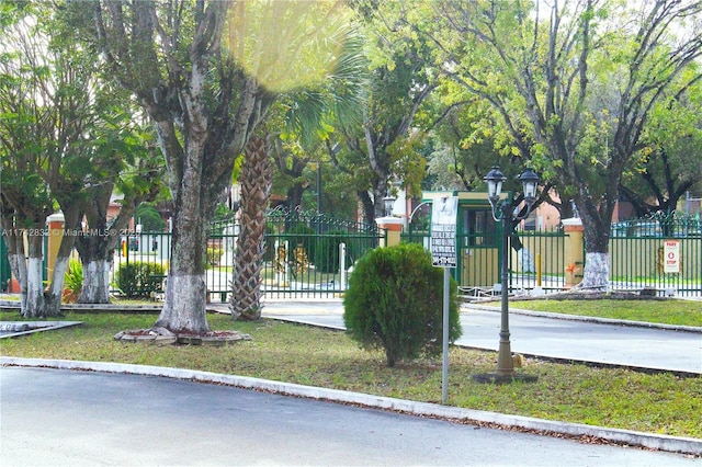 surrounding community with a playground and a lawn