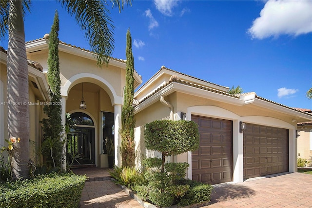 view of front of property featuring a garage