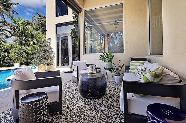 view of patio / terrace featuring ceiling fan