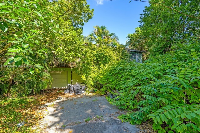 view of yard with a garage