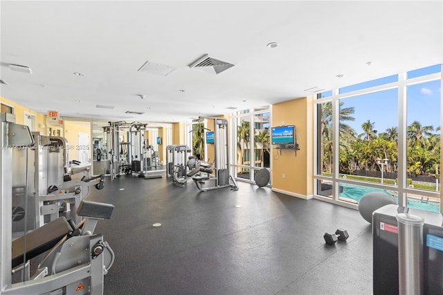 workout area with expansive windows